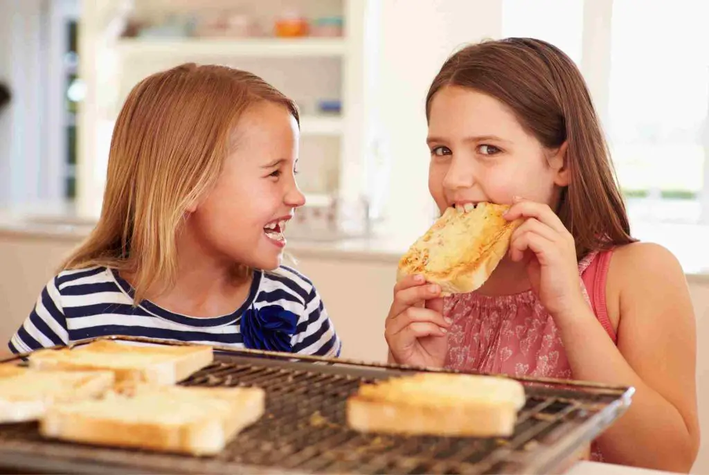 Kids eating grilled cheese